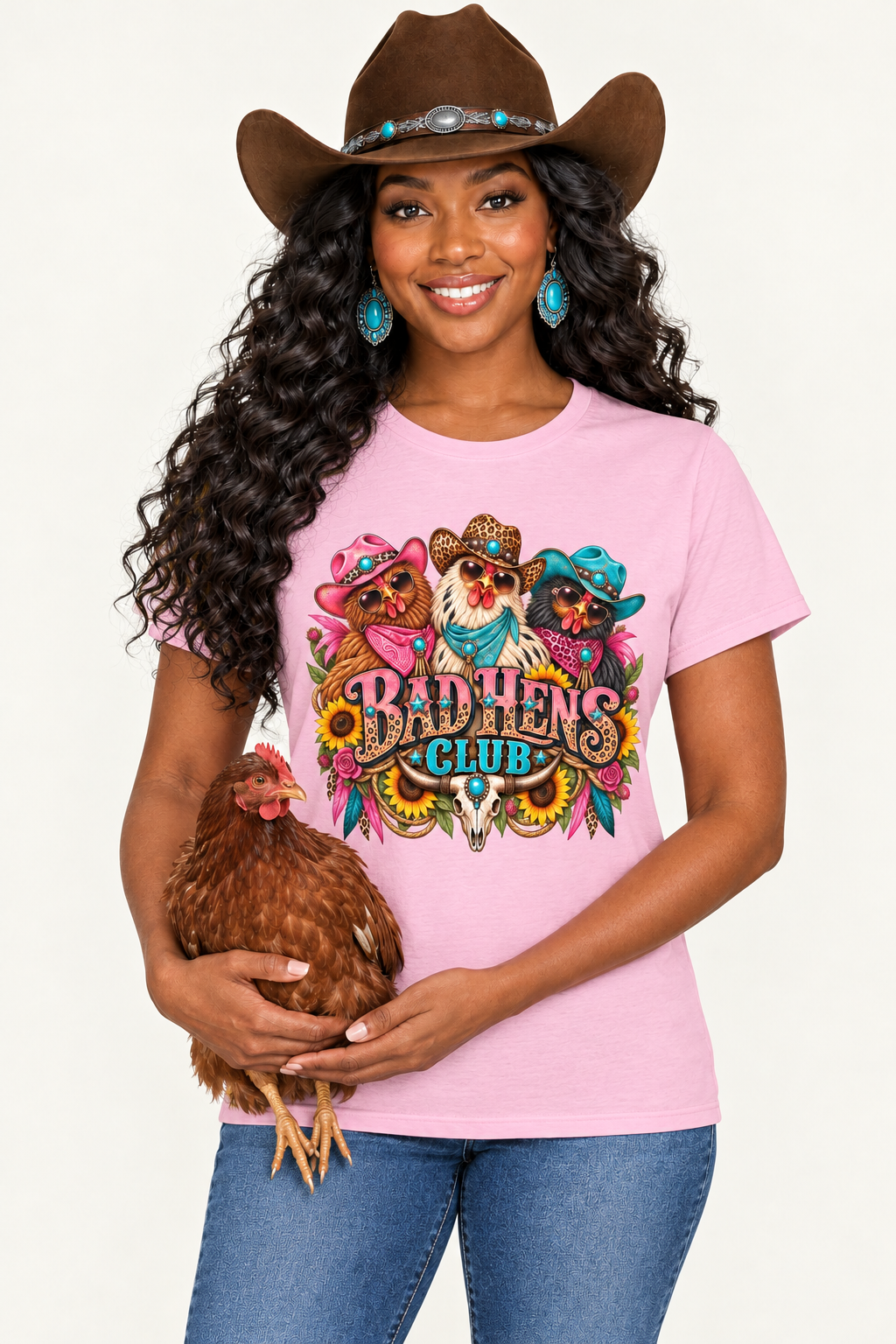Black cowgirl wearing the pink Bad Hens Club tee and holding a red hen