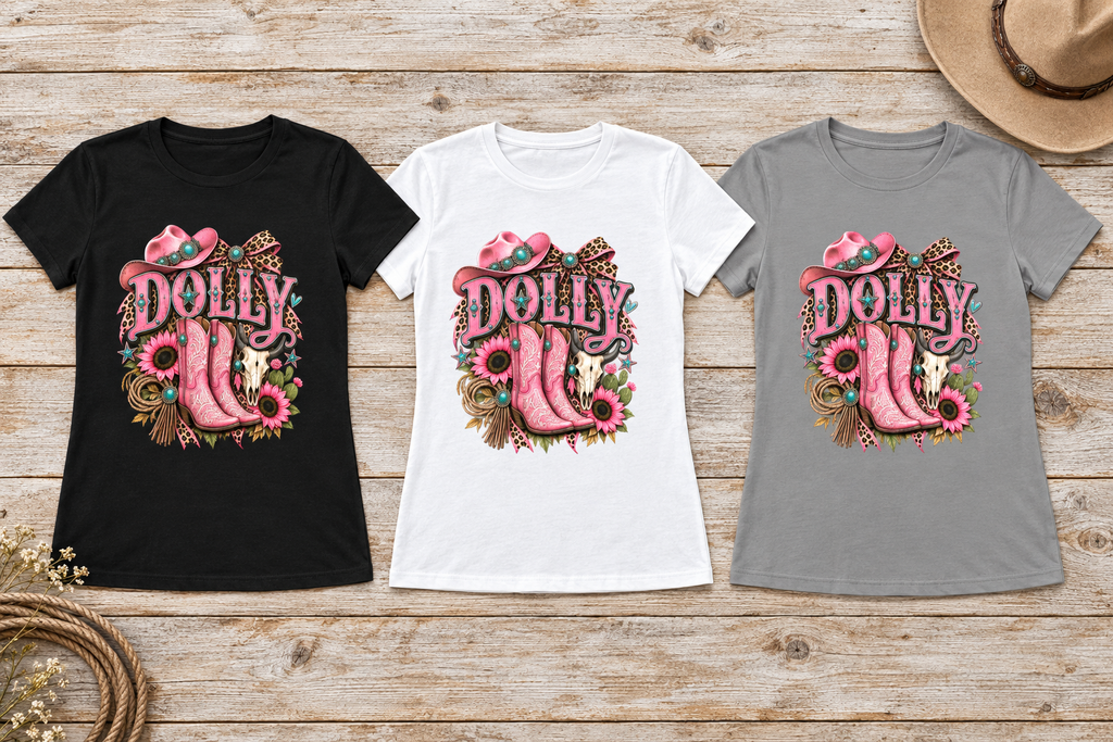 Black, white, and solid grey Dolly tees in a western flat lay