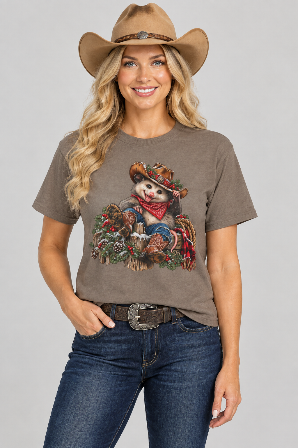 Blonde cowgirl wearing Pete tee in the uploaded taupe-brown color, single studio shot