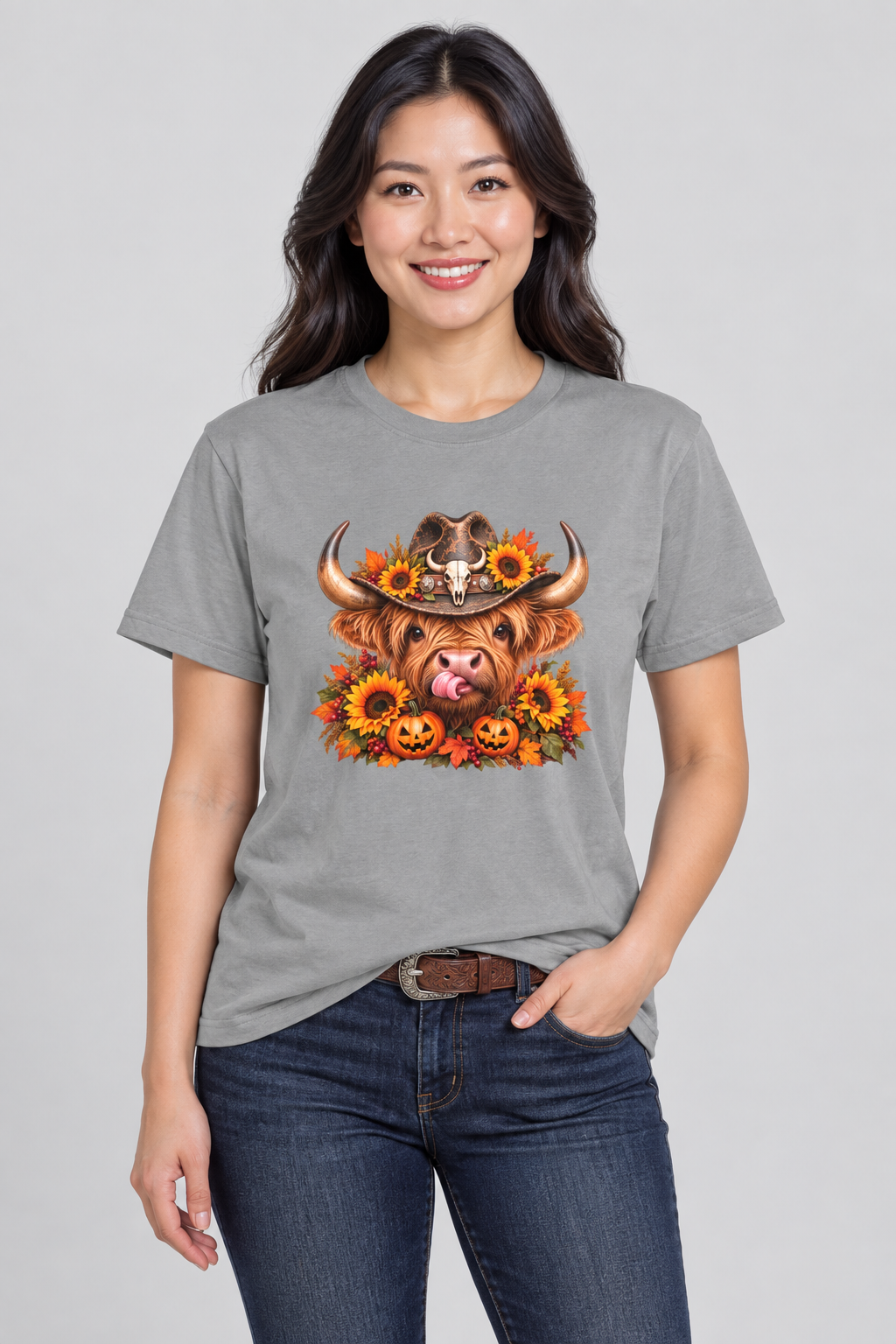 Chinese woman wearing the grey Highland Cow Halloween tee in a clean studio