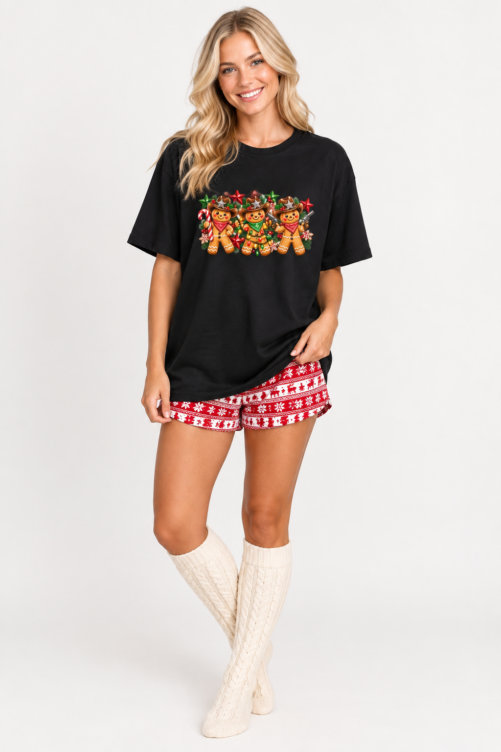 Clean studio mockup, black tee with gingerbread cowboys, knee-high socks