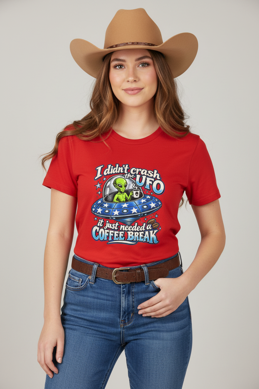 Cowgirl wearing the red alien coffee break tee, studio shot