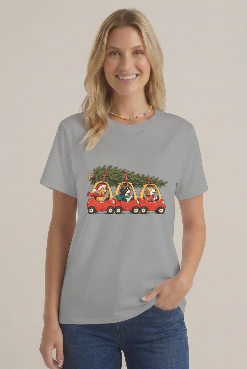 Happy model wearing the gray Christmas dogs tee in a single front studio shot