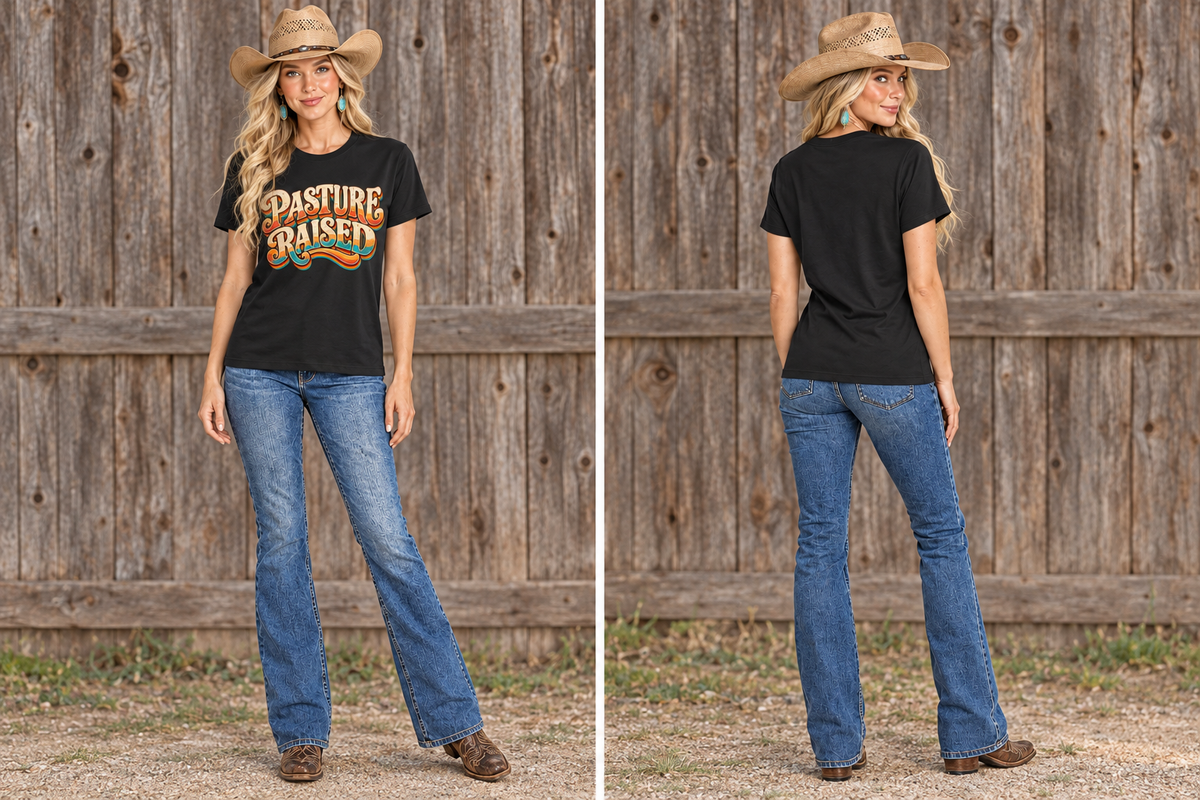 Same blonde cowgirl in the black Pasture Raised tee, front and back against rustic barn wood