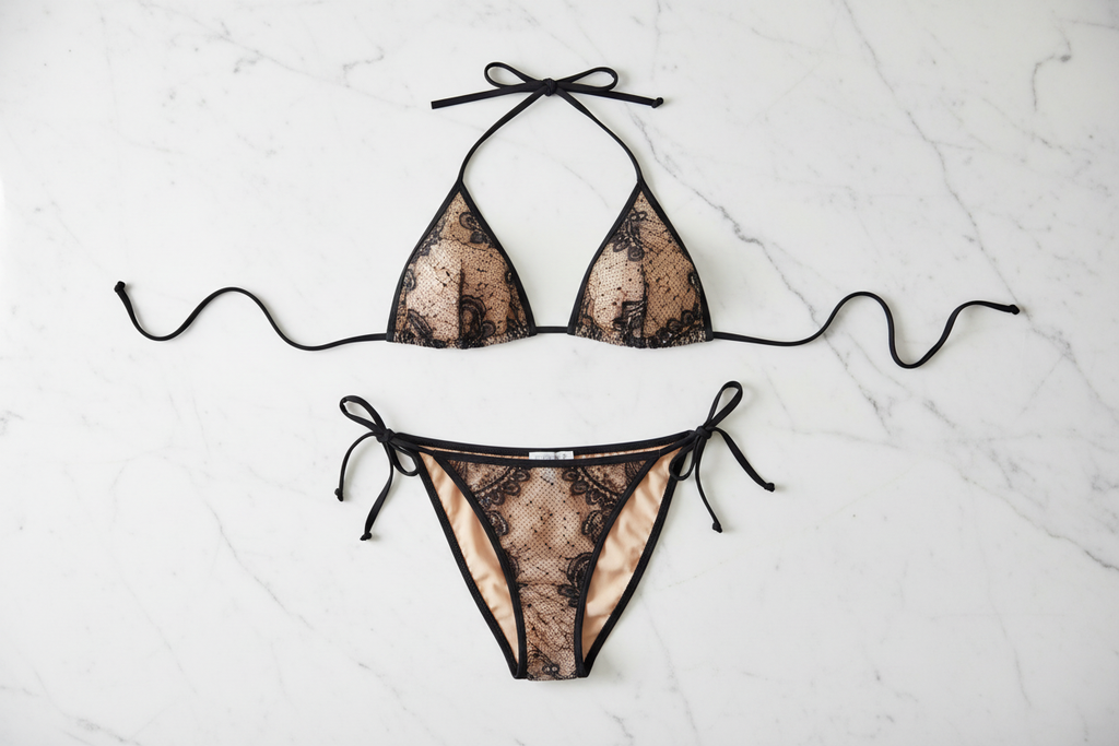 Sheer black floral lace bikini elegant flat lay exact match